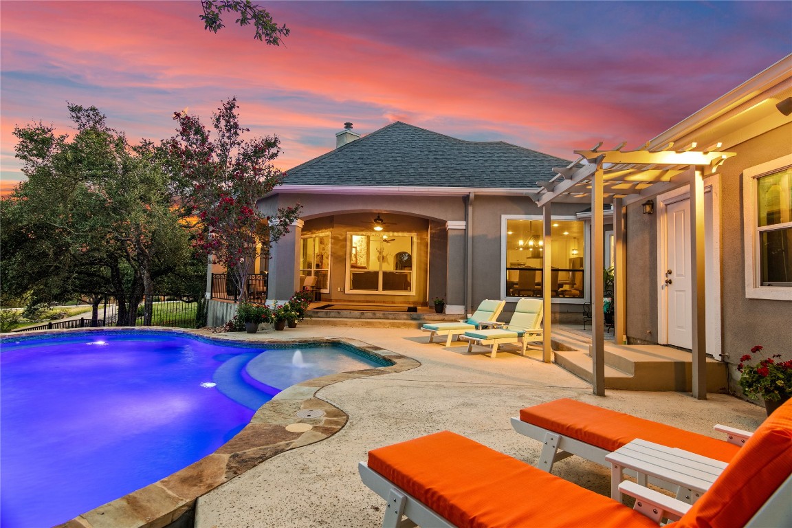 a view of a house with swimming pool