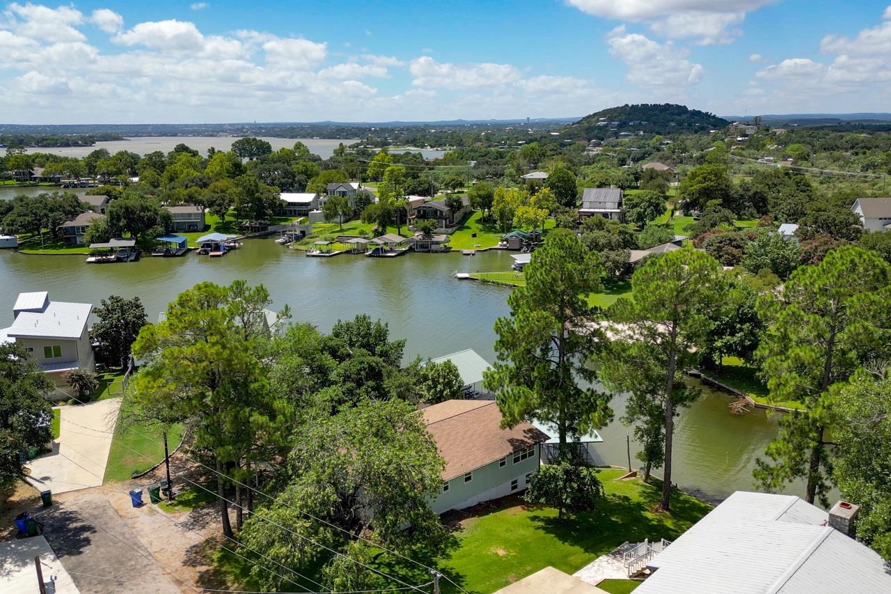 a view of a lake with a city