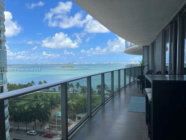 a view of a balcony with an outdoor space