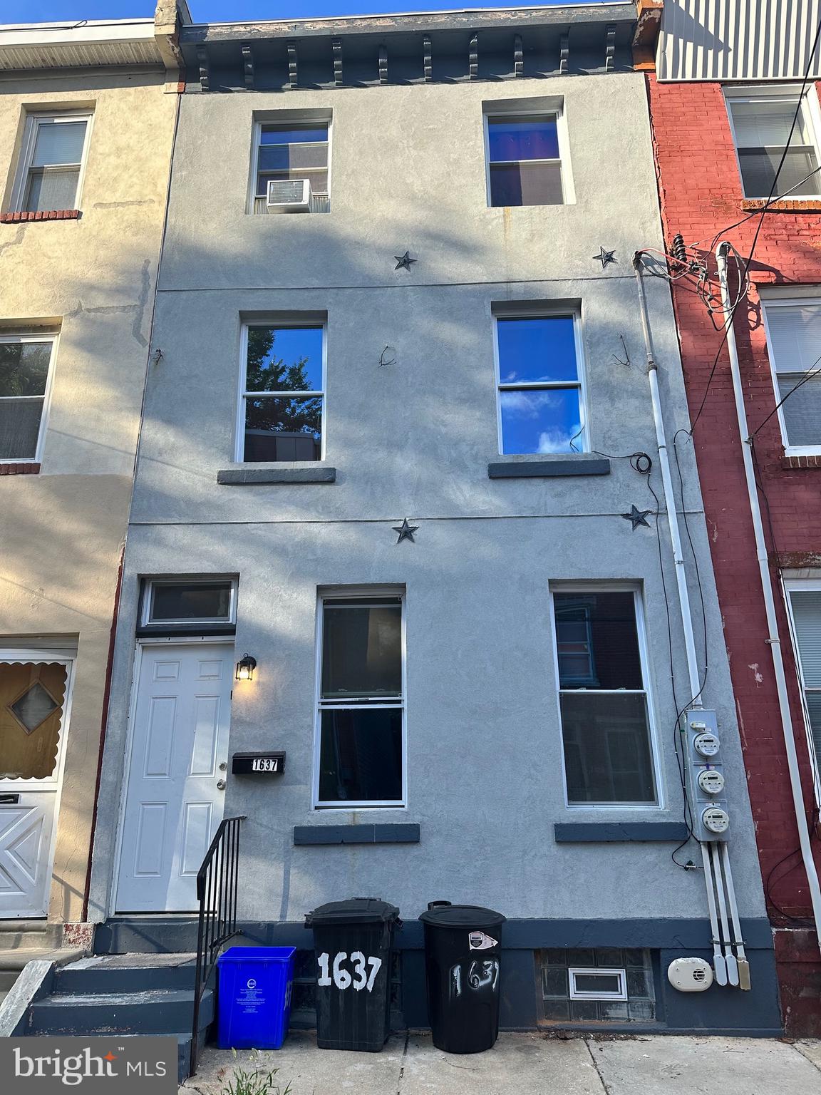 a front view of a house with balcony