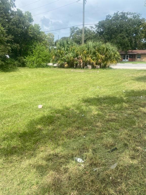 a view of a field with an outdoor space