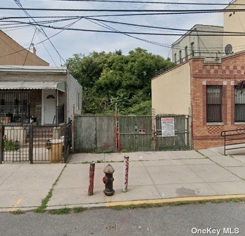 a view of a house with a street