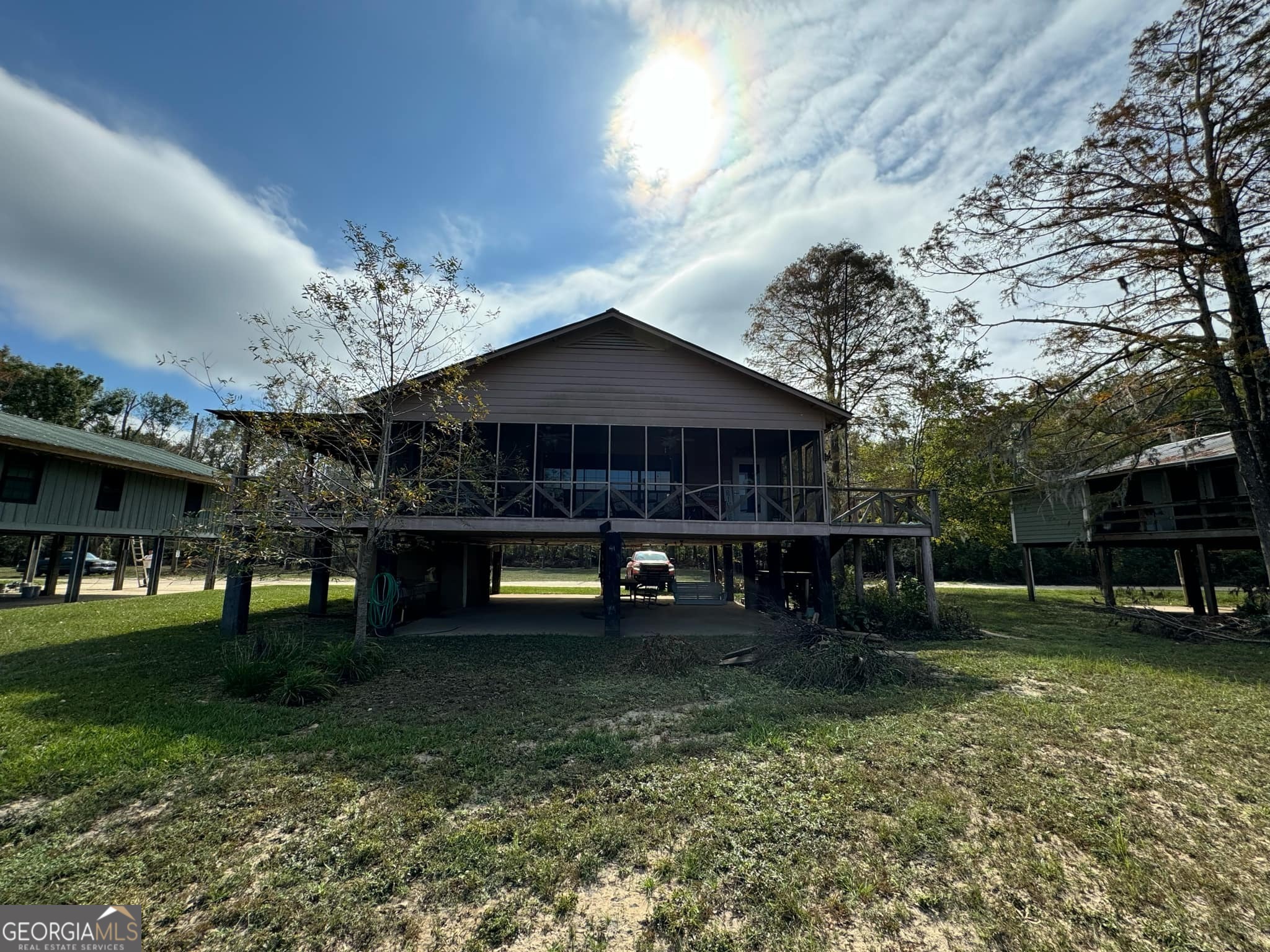 a view of a house with a yard