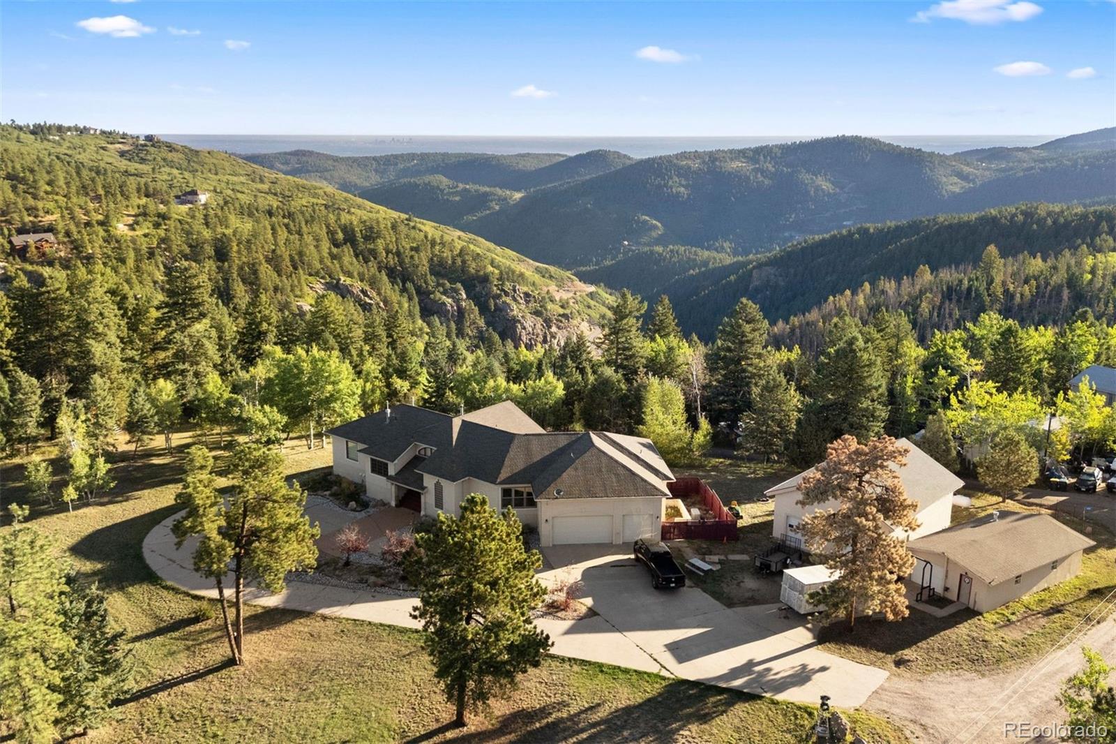 a view of a house with a mountain