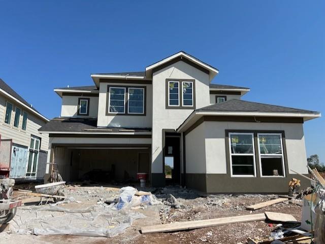 a front view of a house with yard