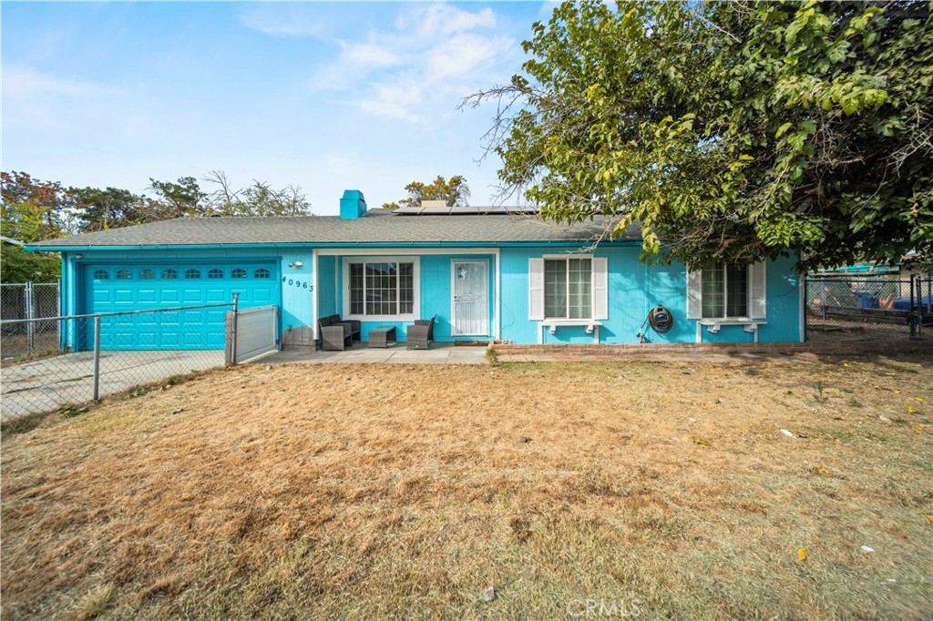 a front view of house with yard