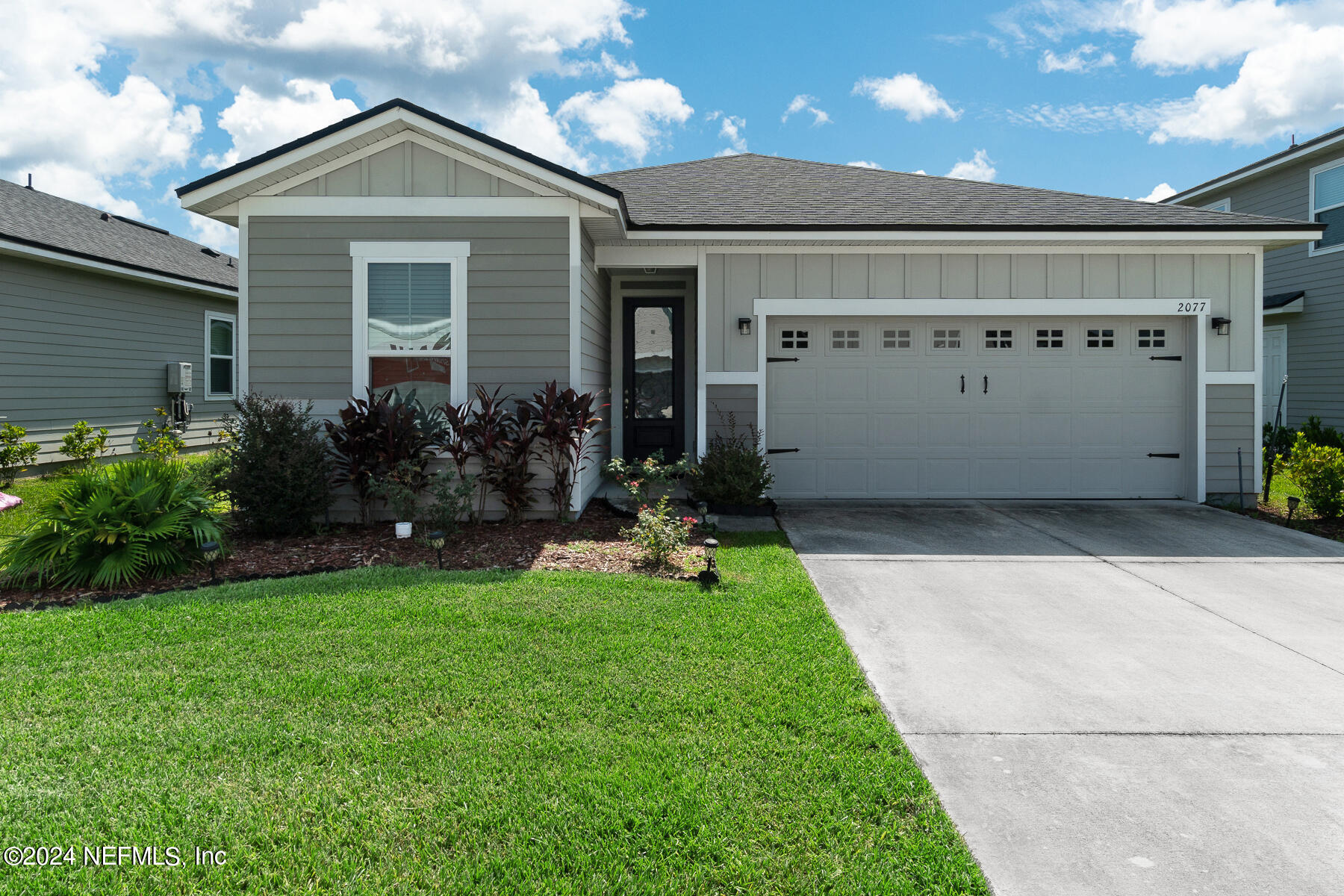 a front view of house with yard