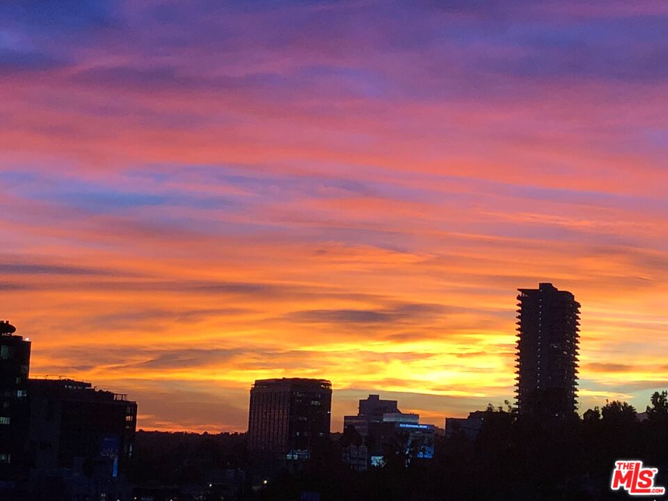 a view of a city with sunset