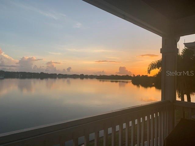 a view of a lake from a balcony