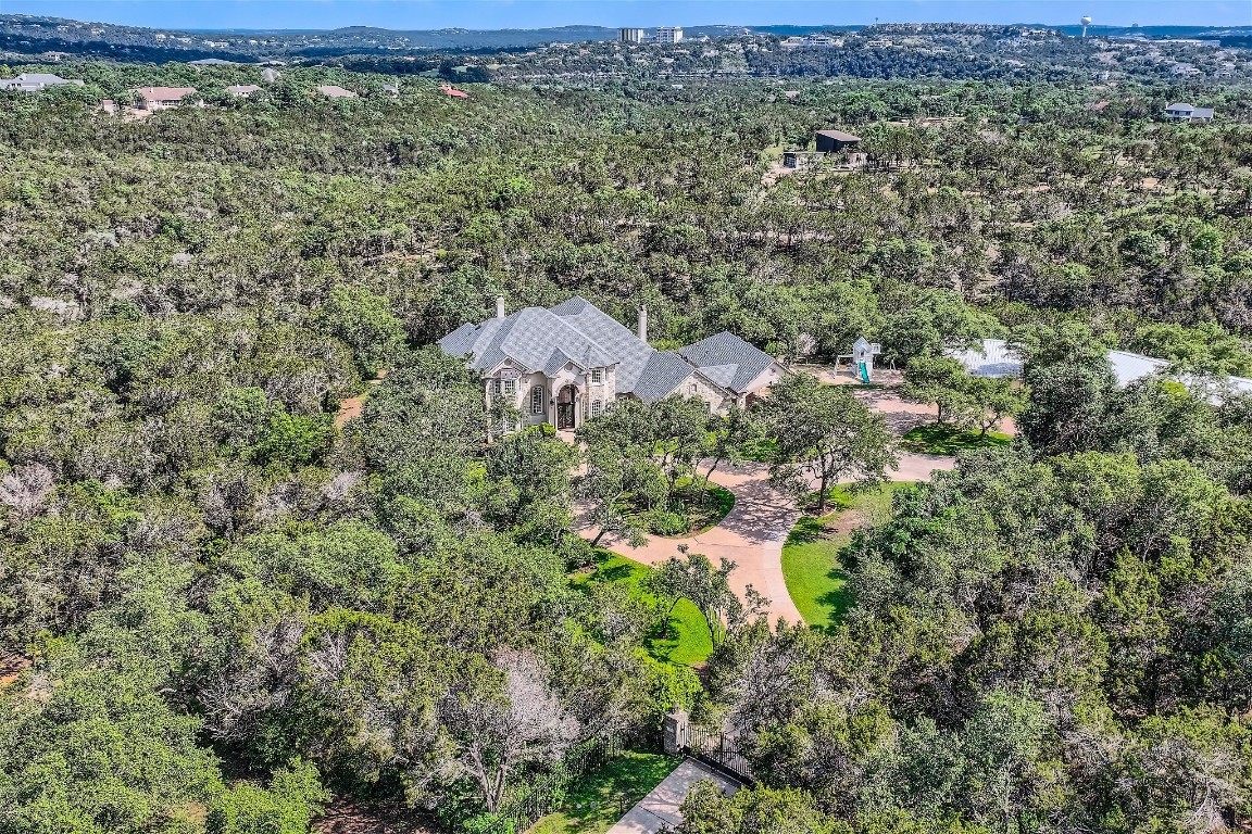 a aerial view of a house with a yard