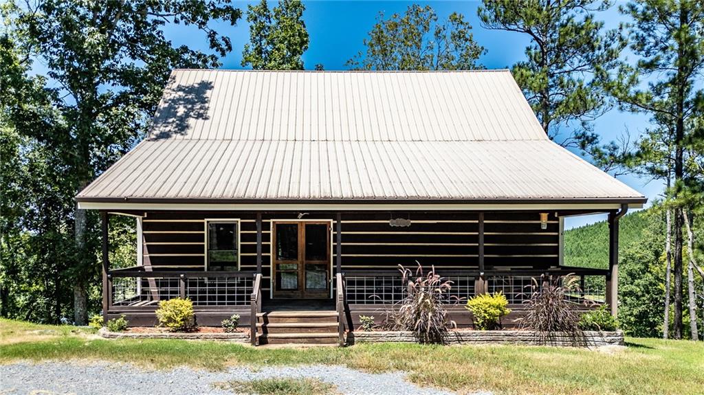 a view of house with outdoor space