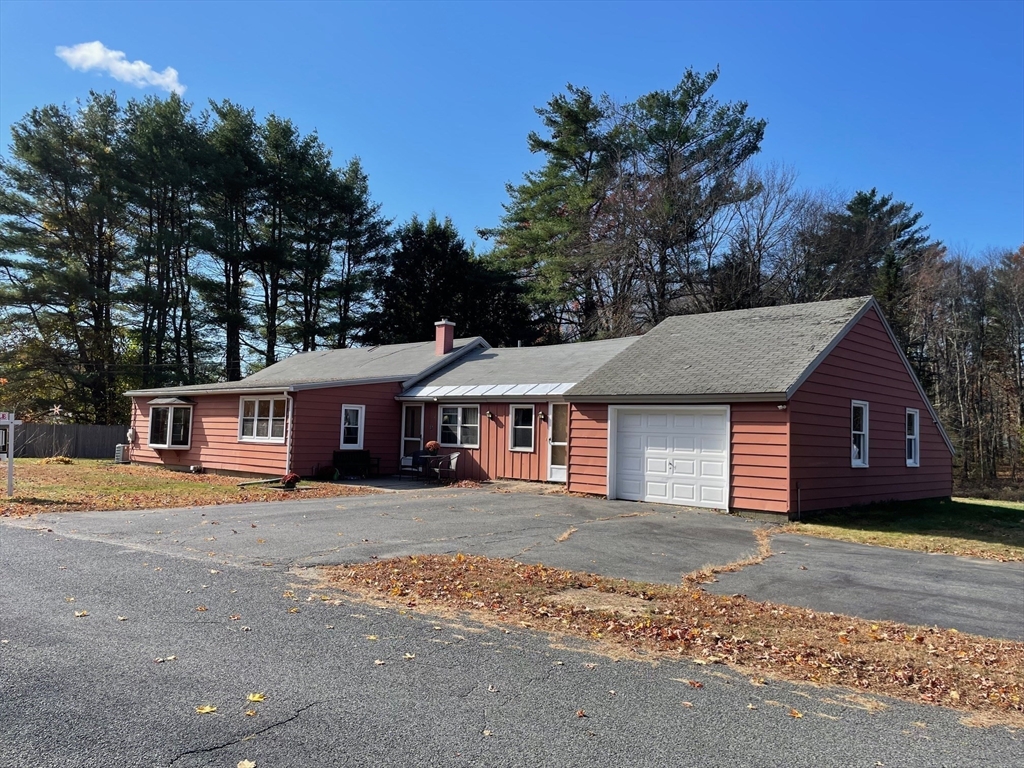 front view of a house and a yard