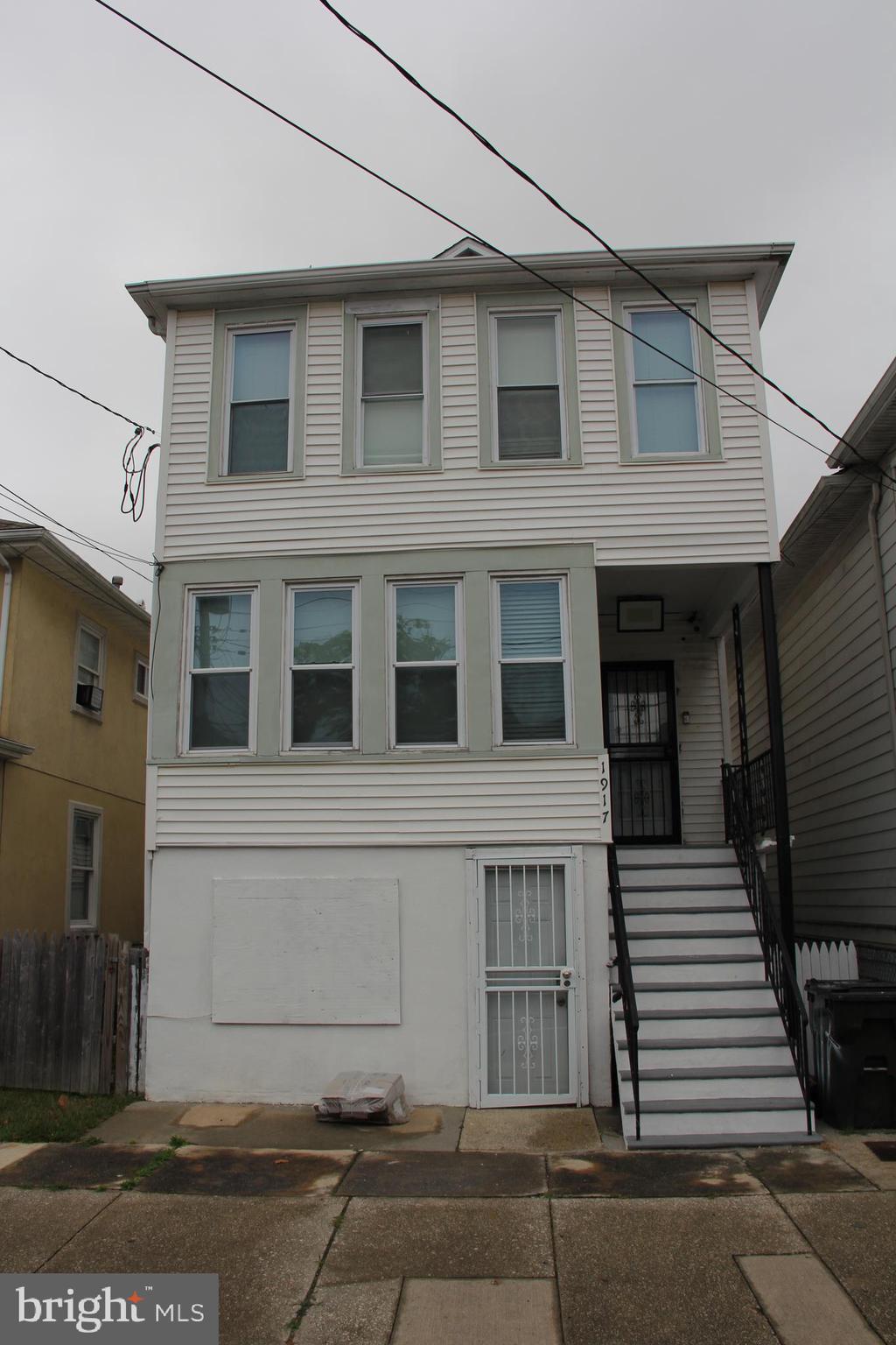 a front view of a house with a garage