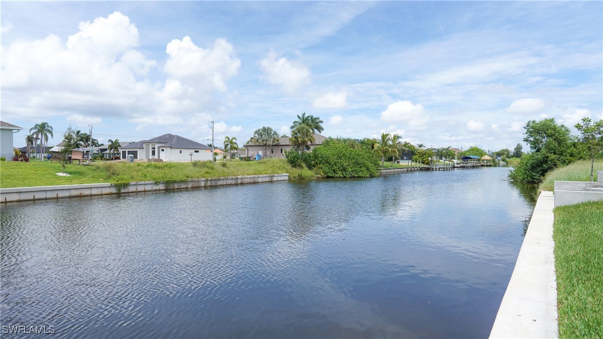 a view of a lake with a city