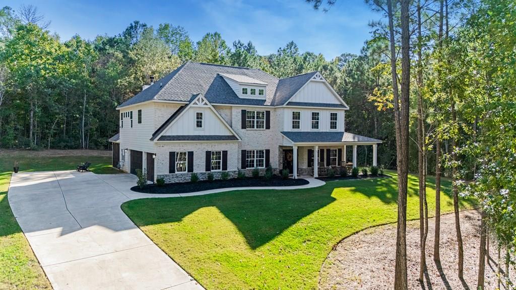 front view of a house with swimming pool