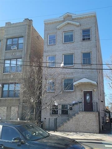 a front view of a house with yard