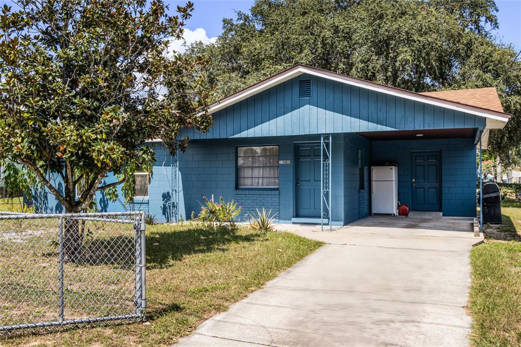 a front view of a house with garage