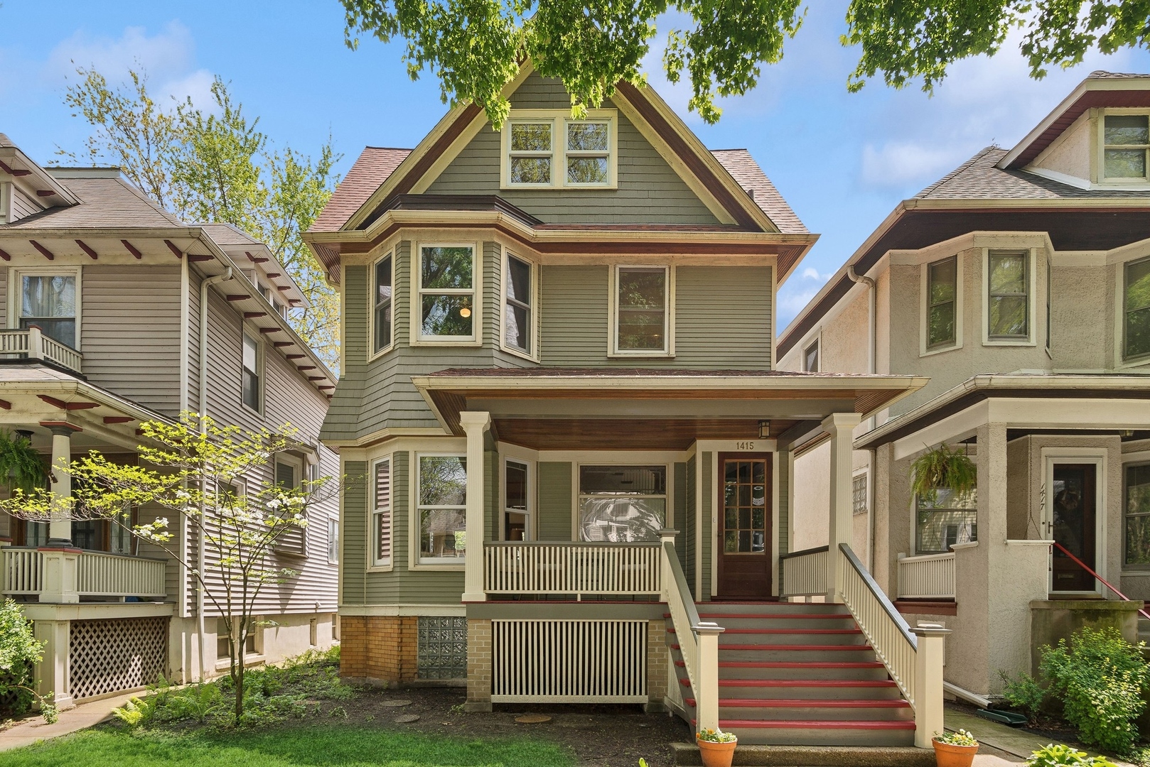 front view of a house with a yard