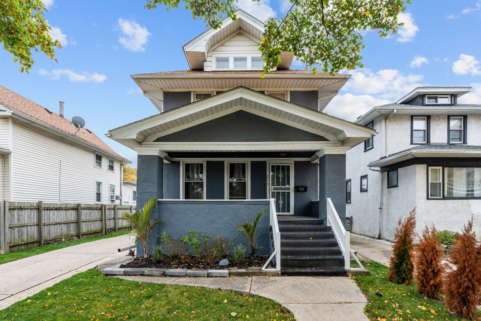 front view of a house with a small yard