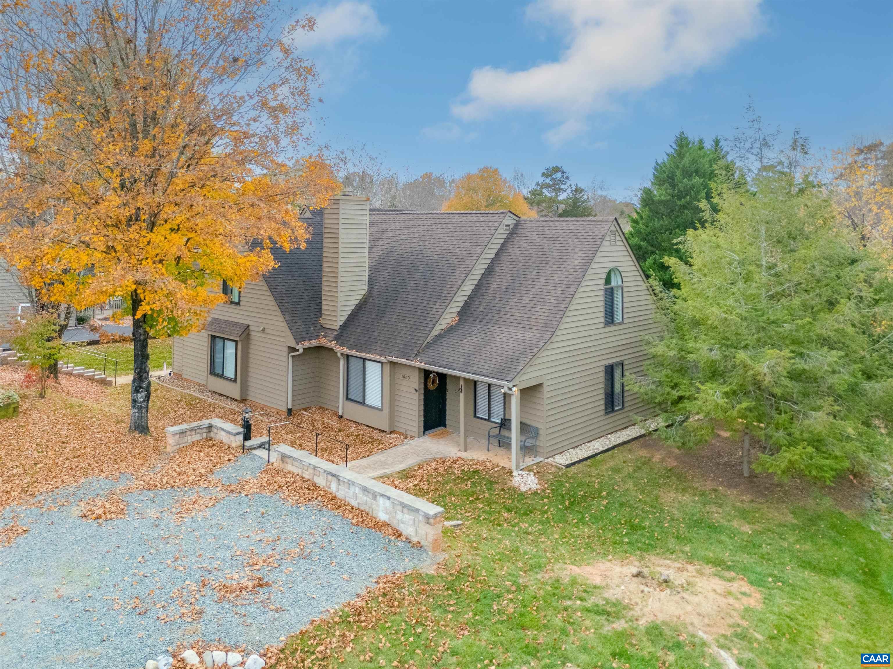 front view of a house with a yard