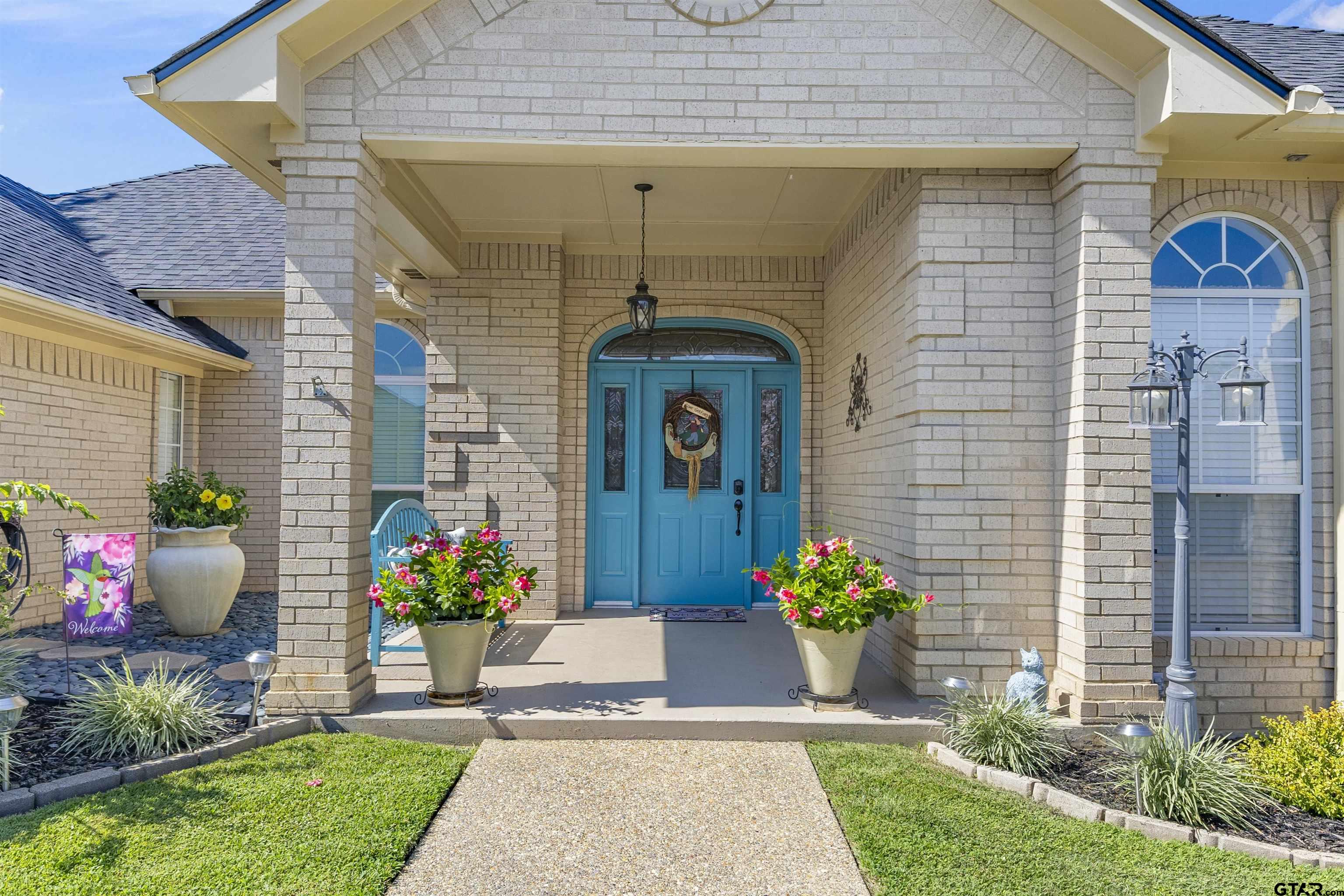 a front view of a house with a porch