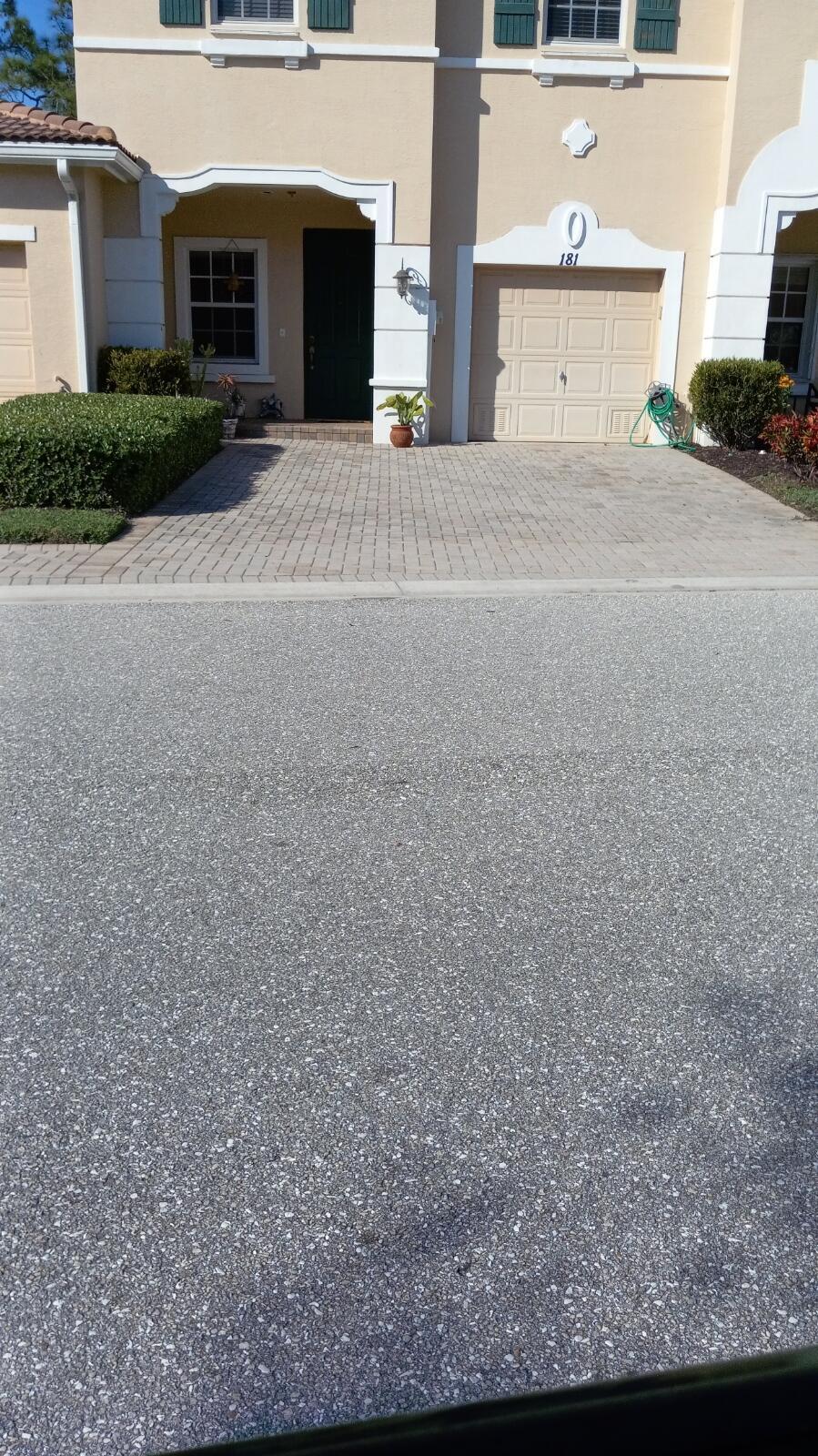 a view of garage with plants