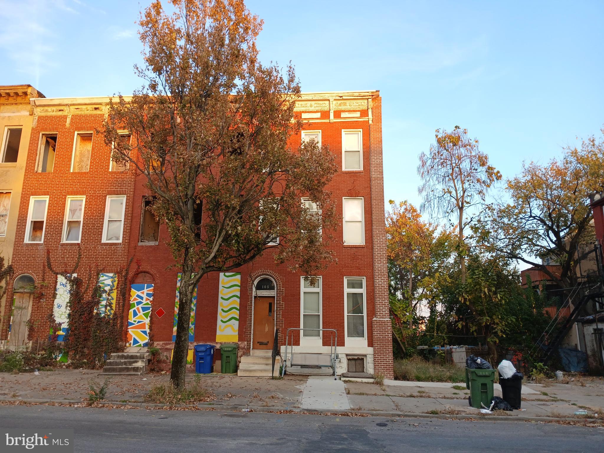 a front view of a building with street view