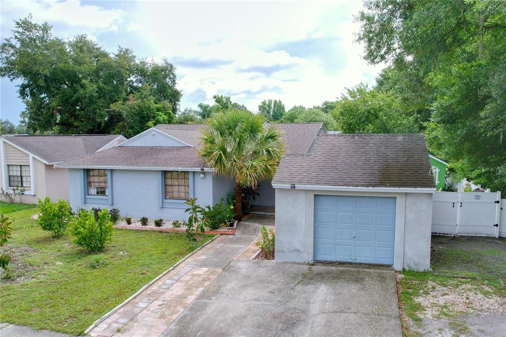 front view of a house with a yard