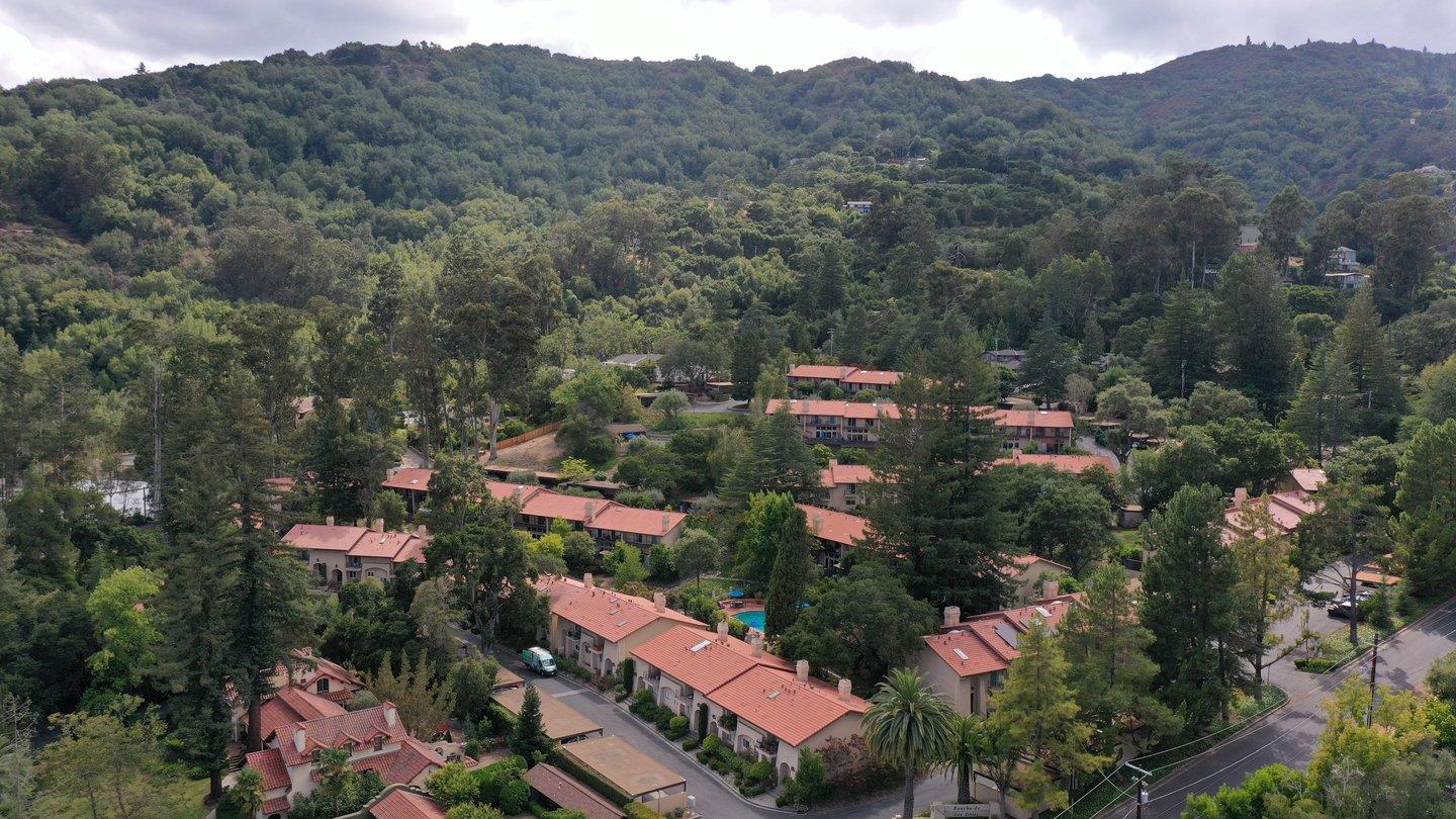 an aerial view of a town with couple of houses