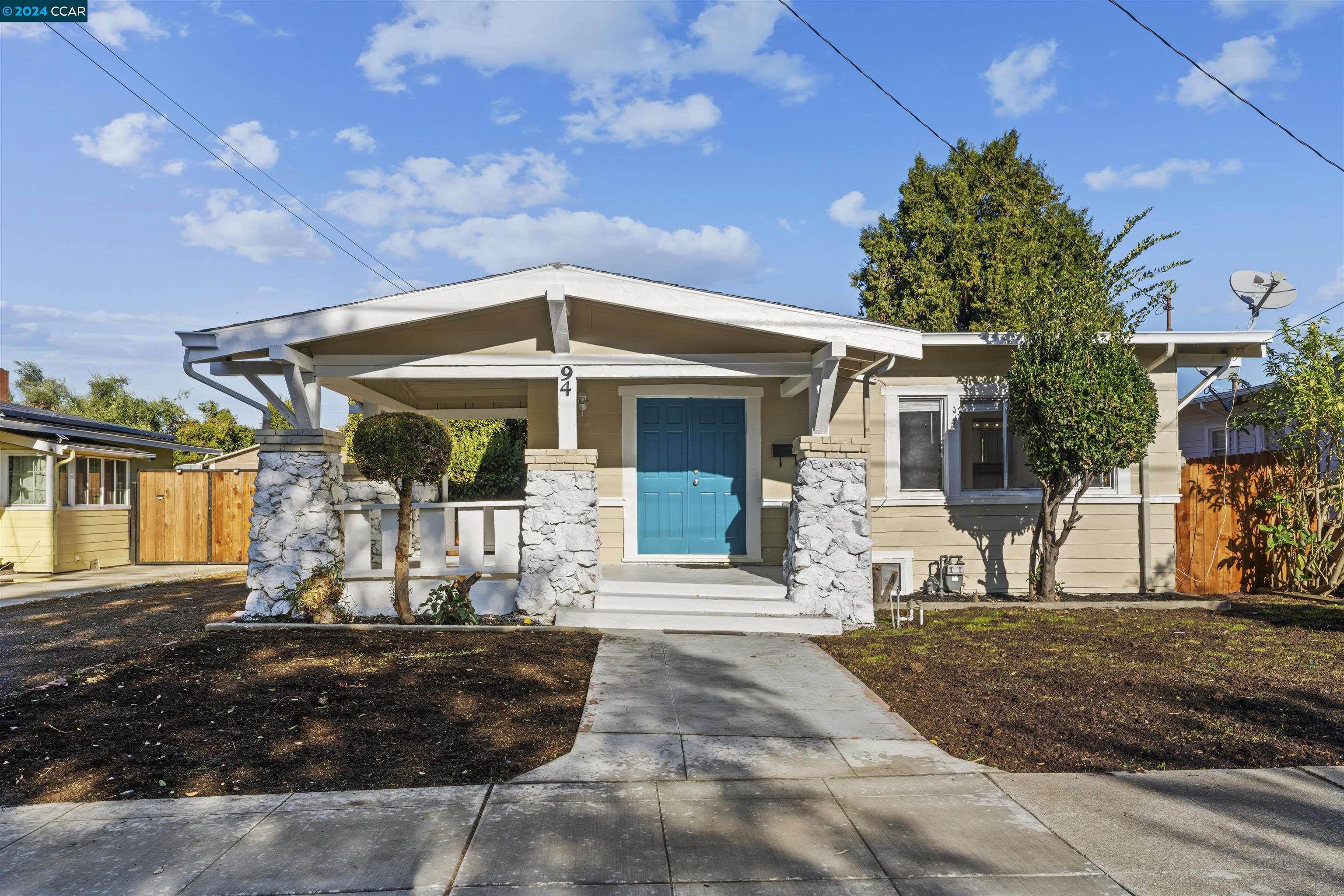 a front view of a house with a porch