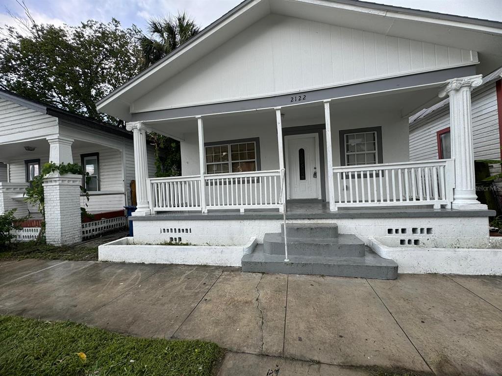 a view of house with front door