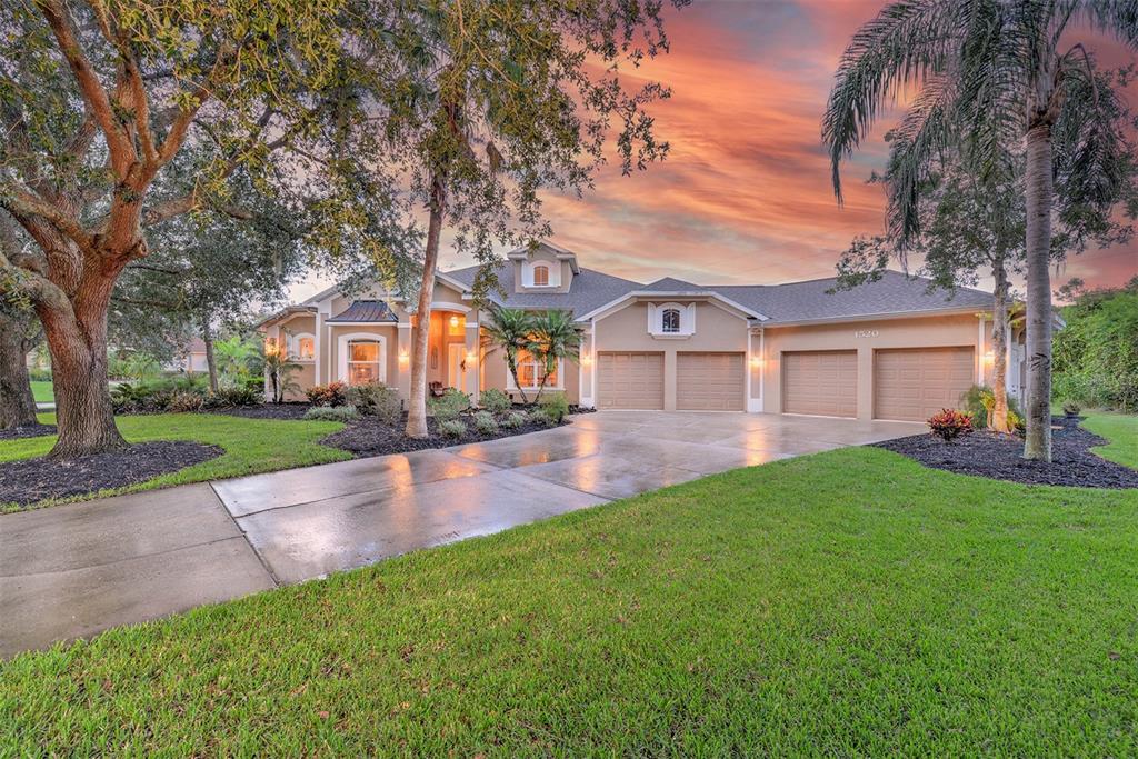 Halifax Plantation. Nestled on a generous lot, this custom-built home beautifully shaded by oak tree