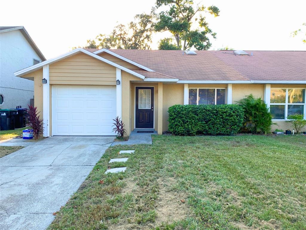 front view of a house and a yard