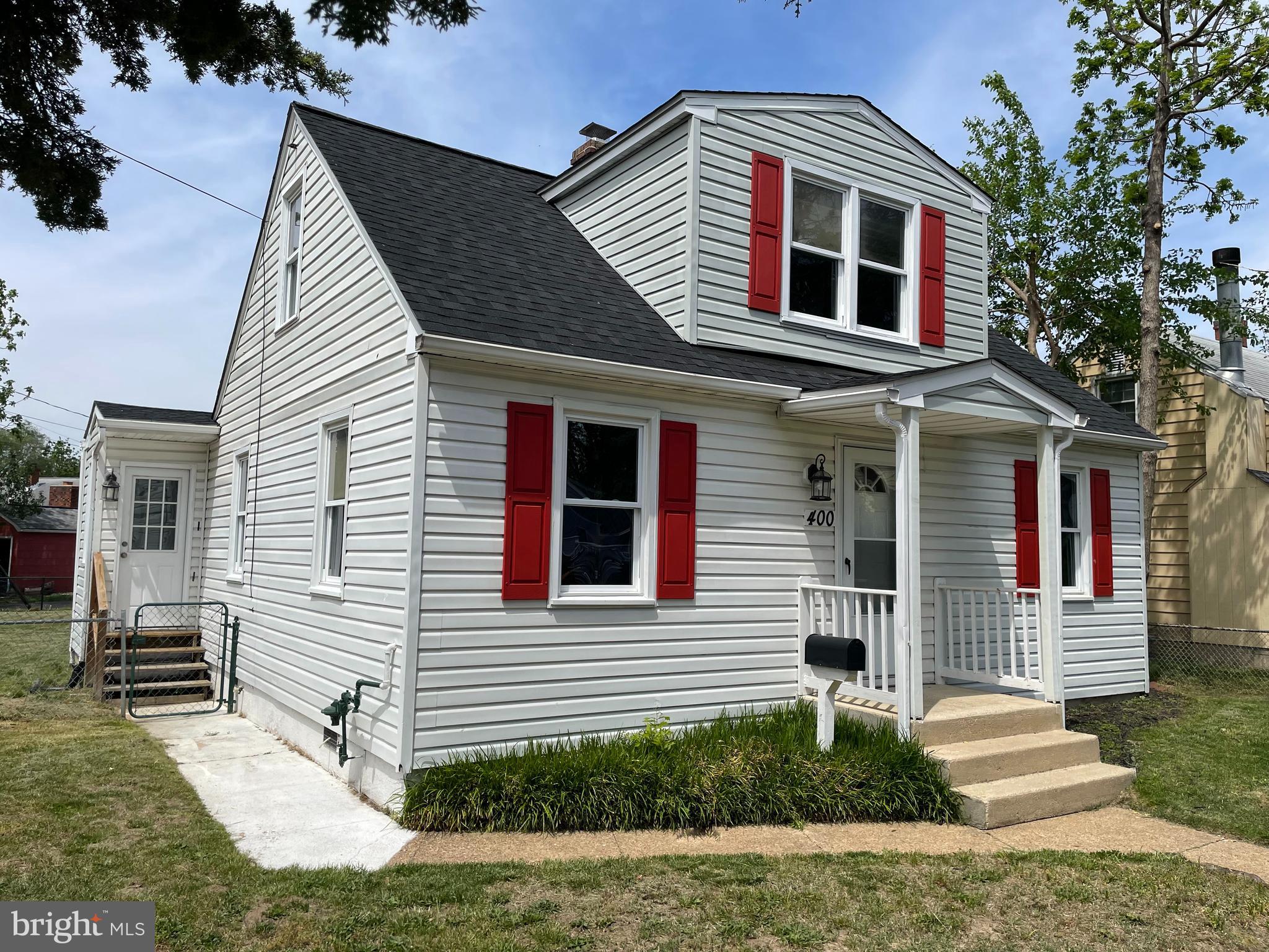 a front view of a house with garage