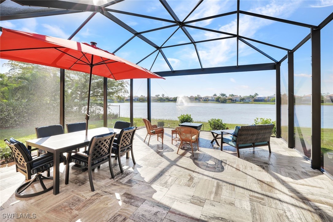 a dining area with furniture and outdoor view