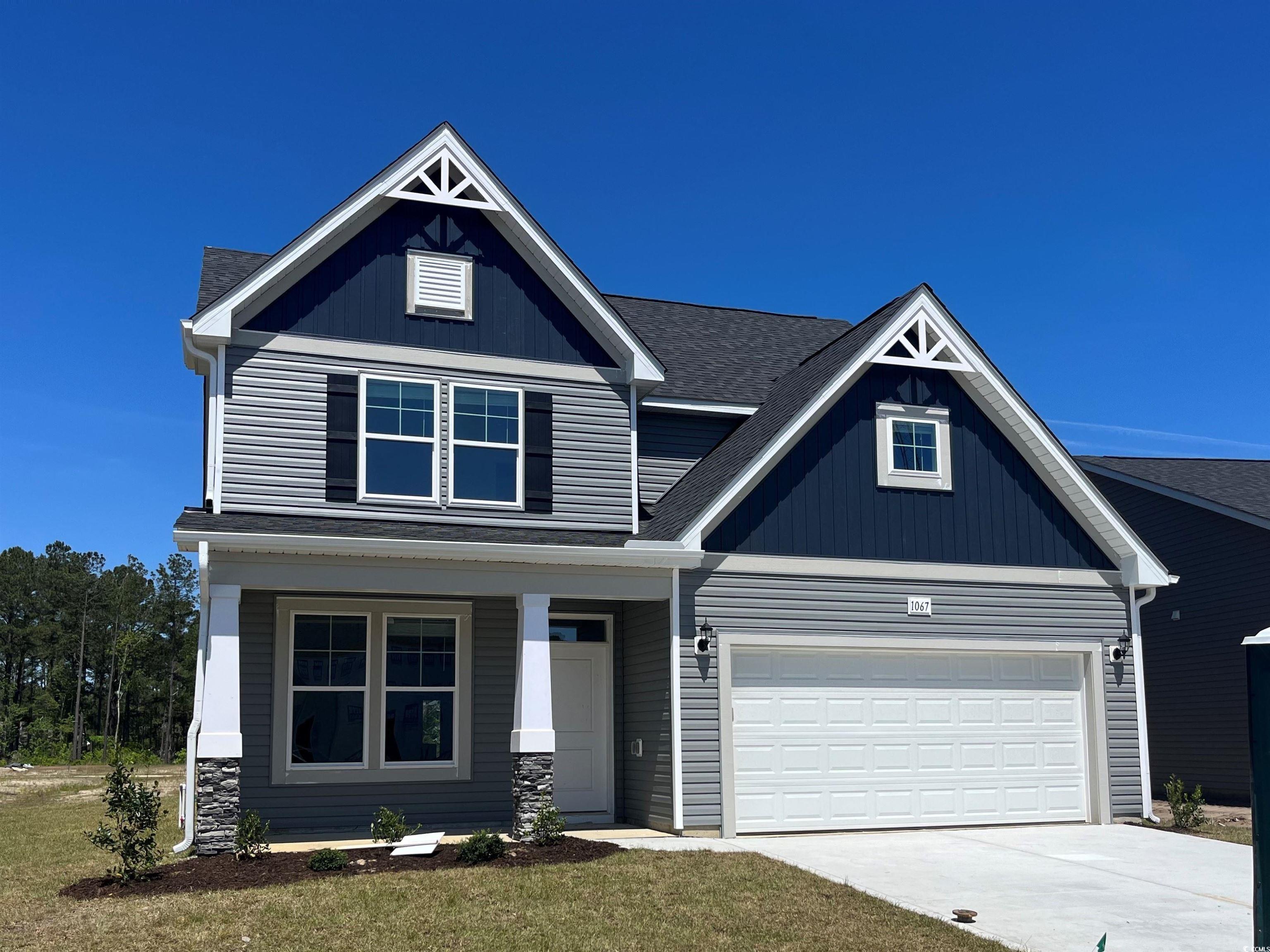 Craftsman-style house with a garage