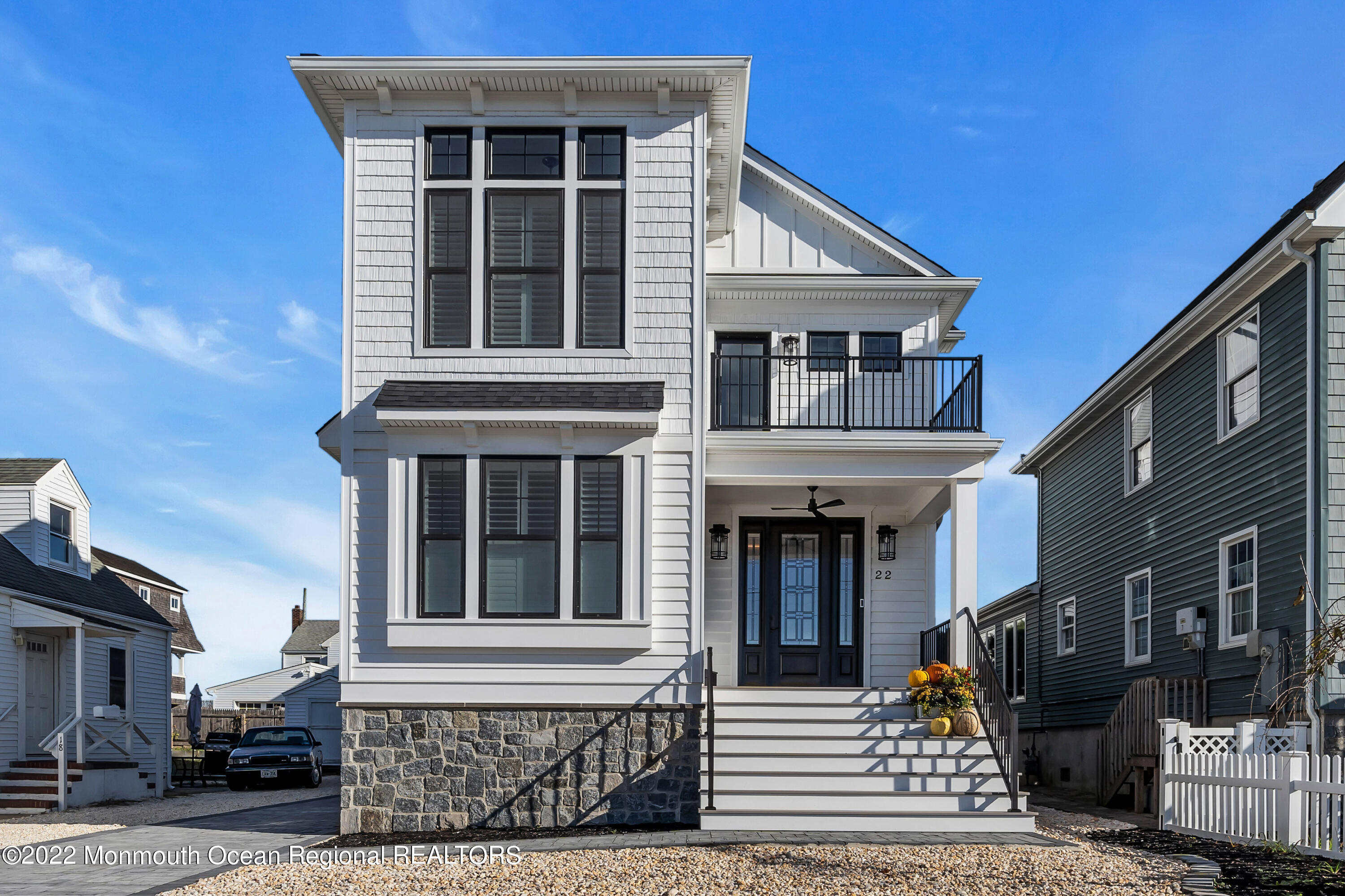 a front view of a house with a porch