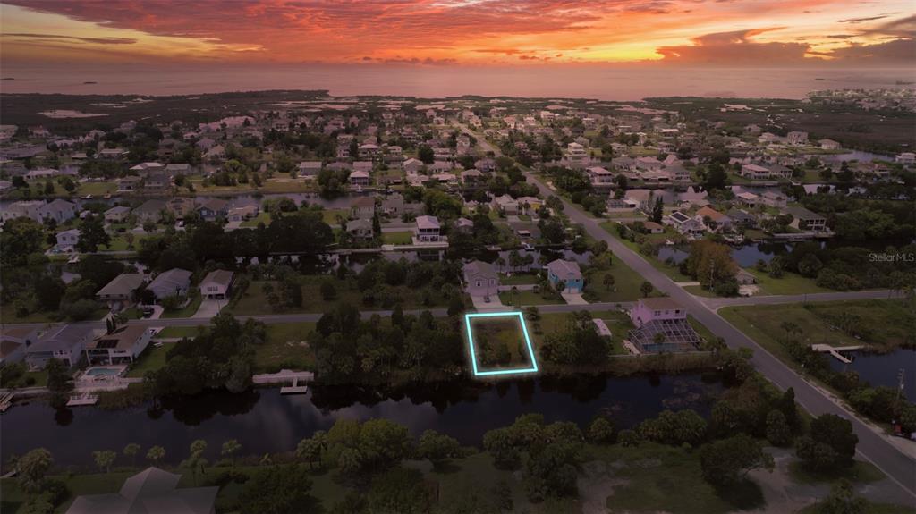 an aerial view of house with yard