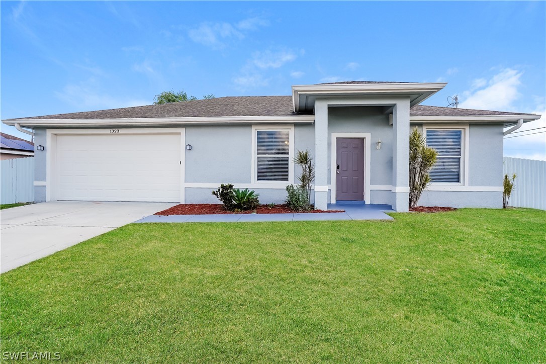 front view of a house with a yard