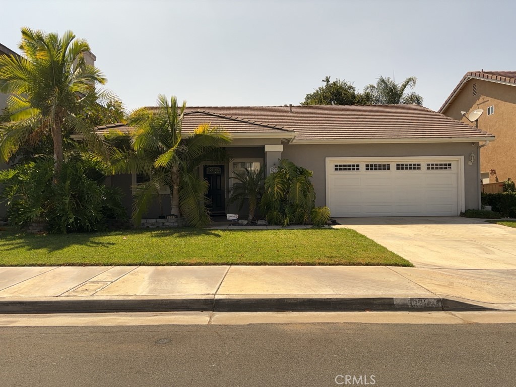 front view of a house and a yard