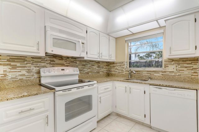 $213,900 | 3810 Via Poinciana, Unit 206 | Poinciana Place