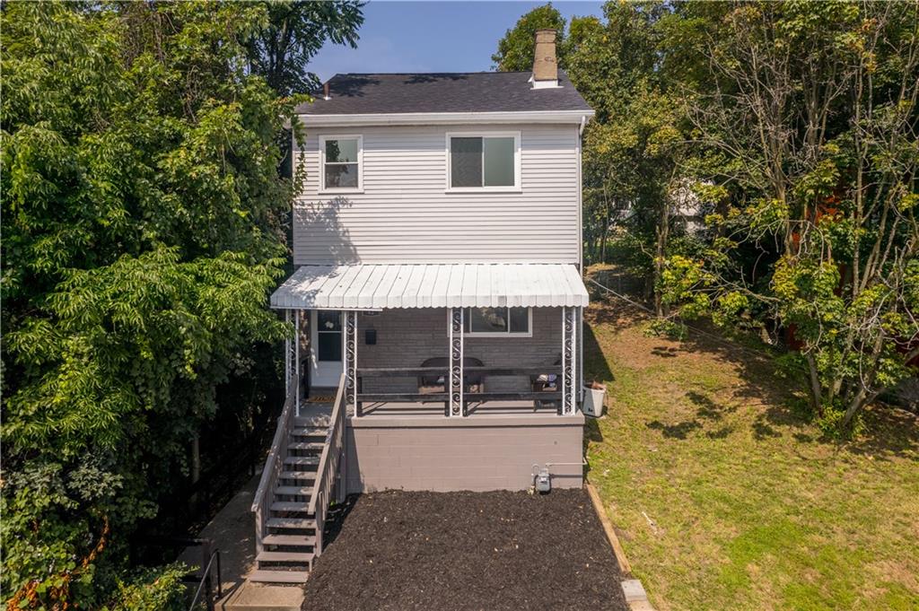 a front view of a house with garage