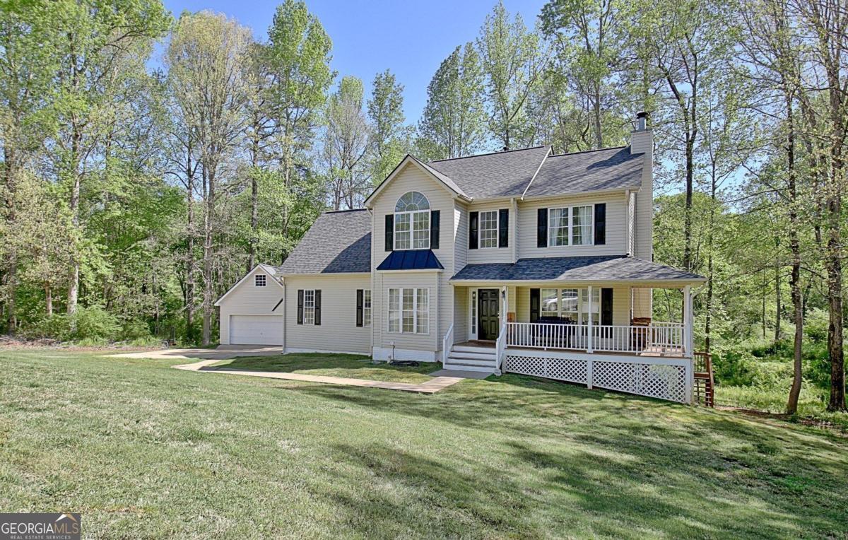 front view of a house with a yard