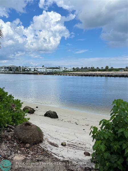 a view of a lake with a beach