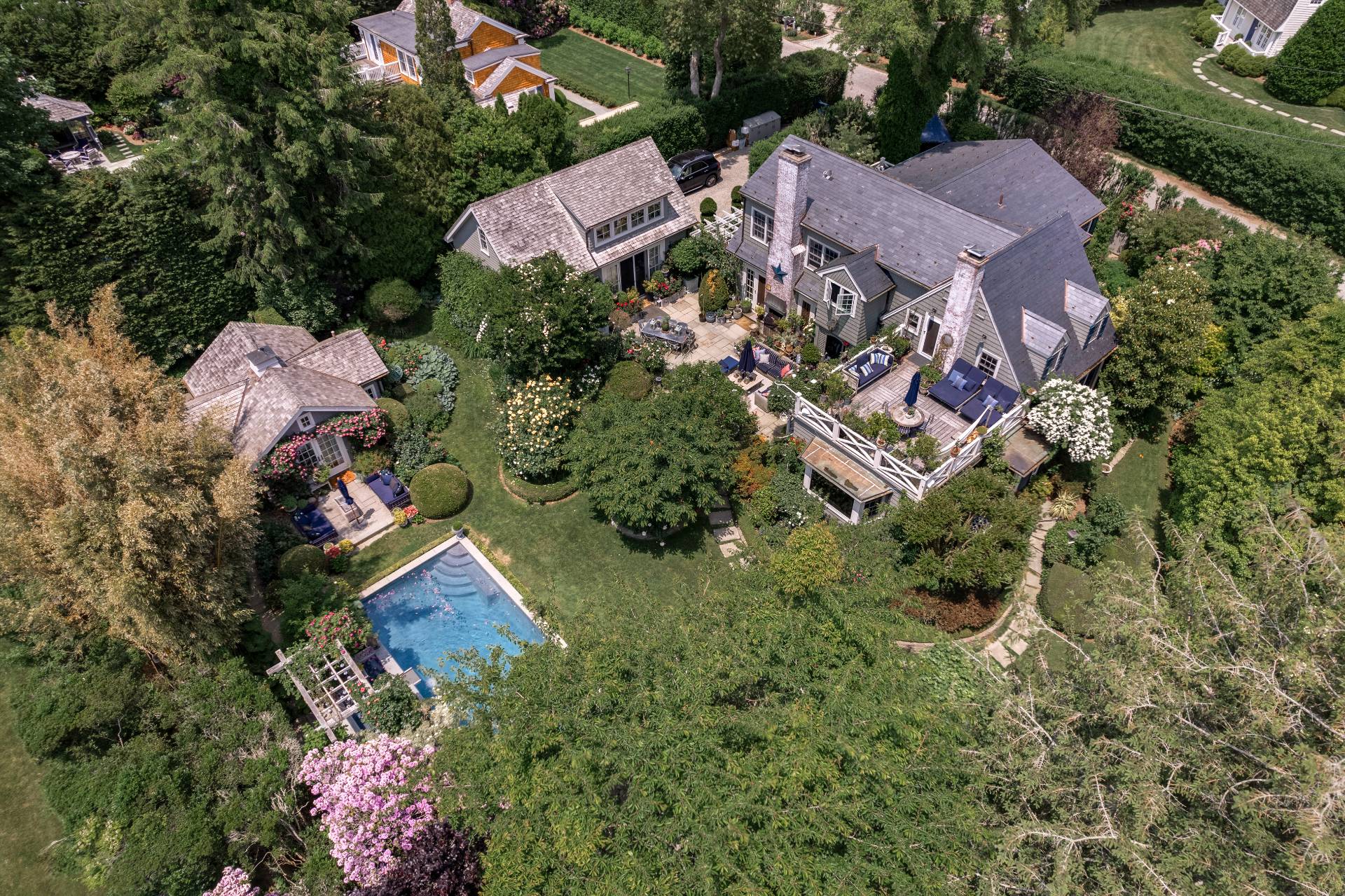 an aerial view of houses with yard