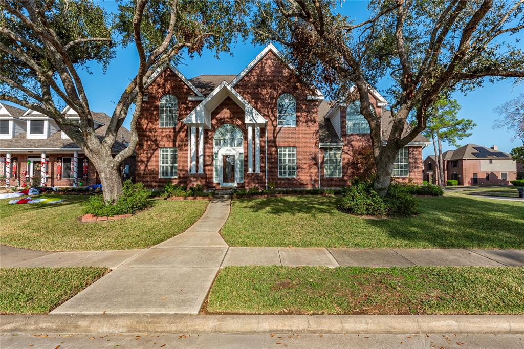 front view of house with a yard