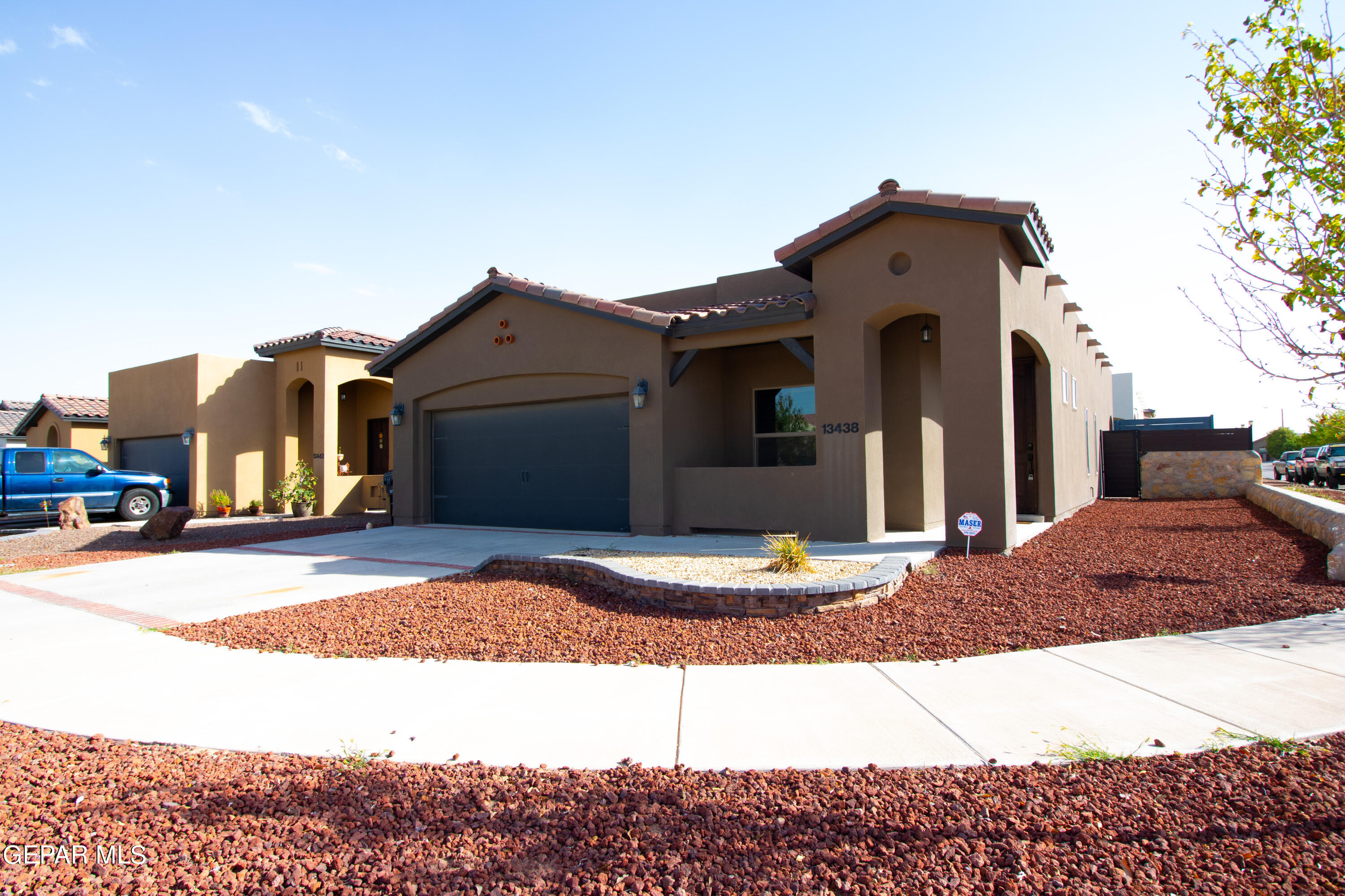 a view of outdoor space and front view of a house