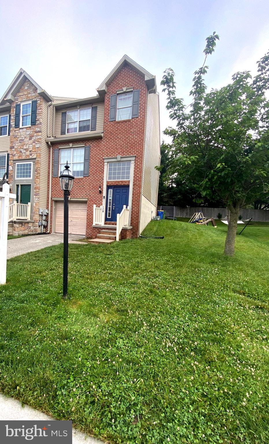 a house view with a garden space