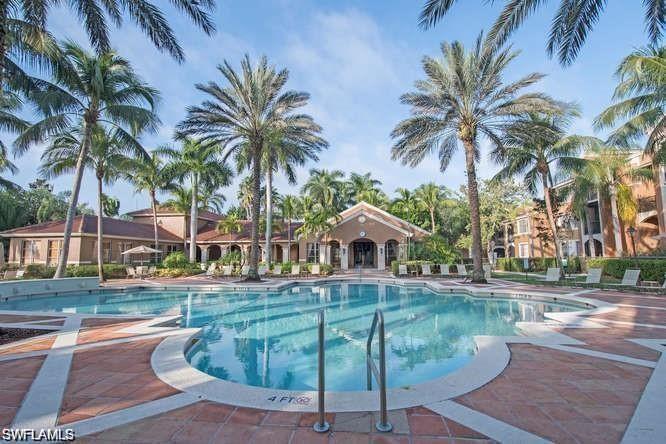 View of swimming pool with a patio area