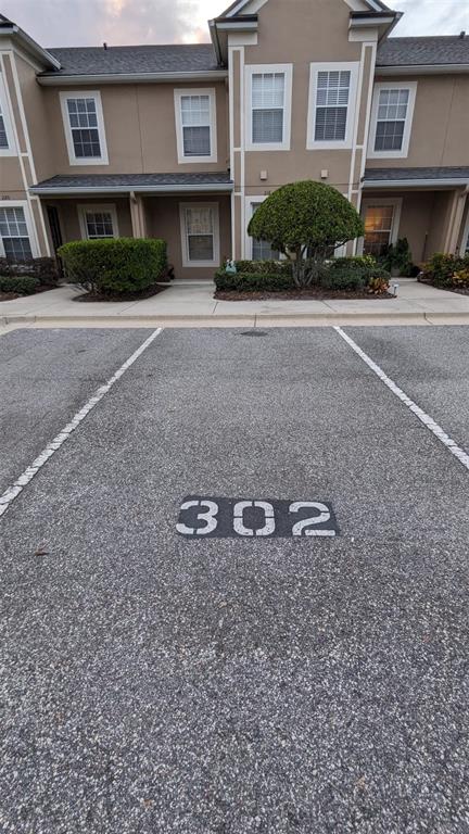 a front view of a house with yard